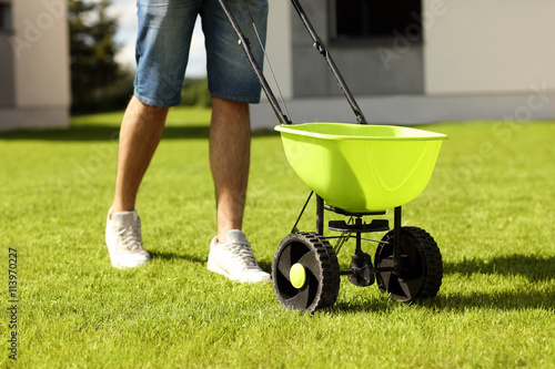 Man with seeder photo