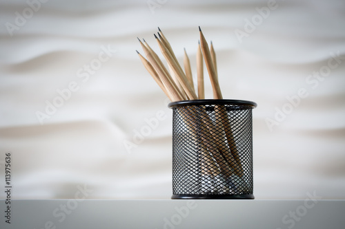 Lead pencils in metal pot