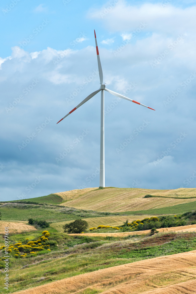 Wind turbine on a rural hilltop