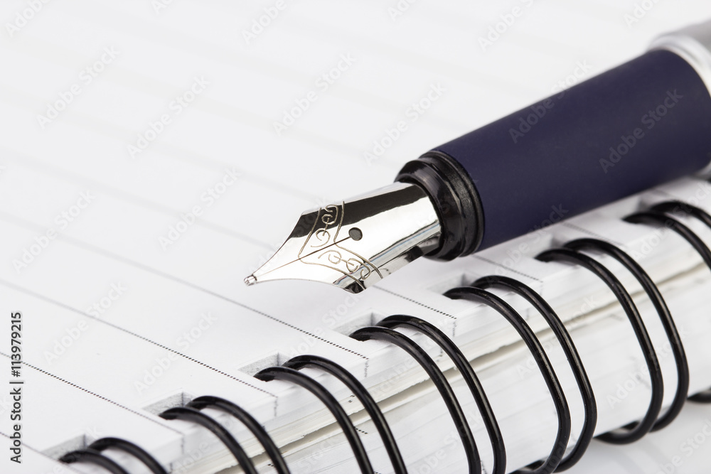 Fountain pen and notebook. As Business Image. Fountain pen and notebook. As Business Image.