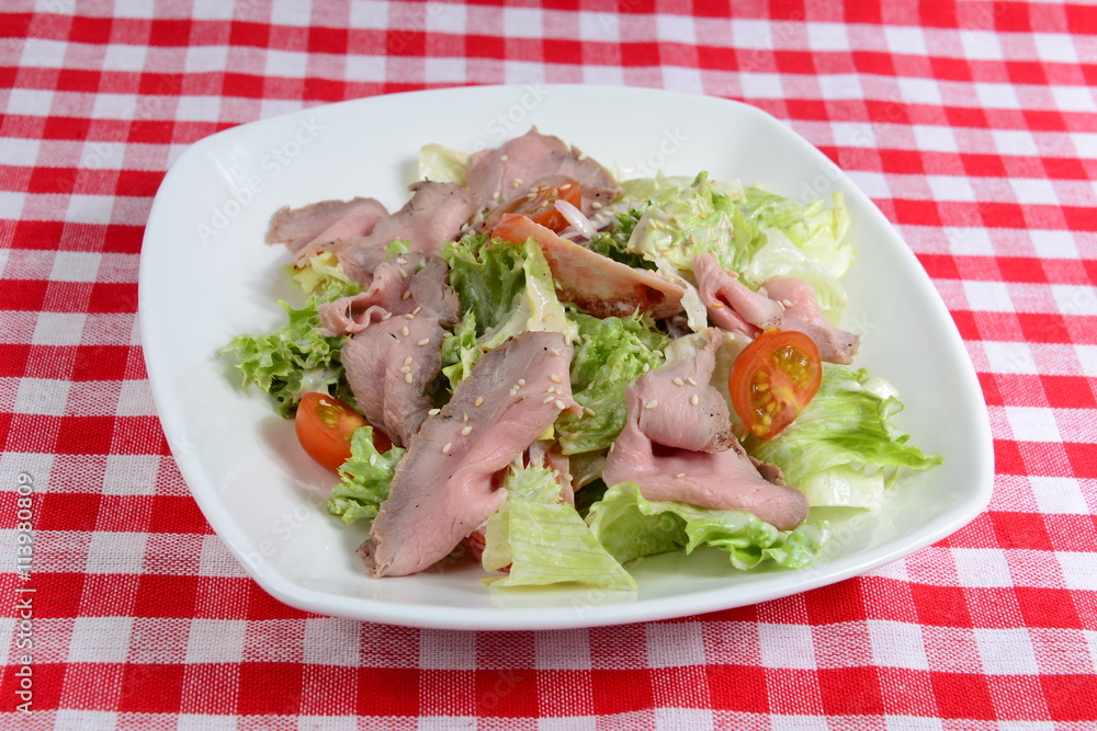 Italian food: fresh salad with Vitello Tonnato Italian food: fresh salad with Vitello Tonnato
