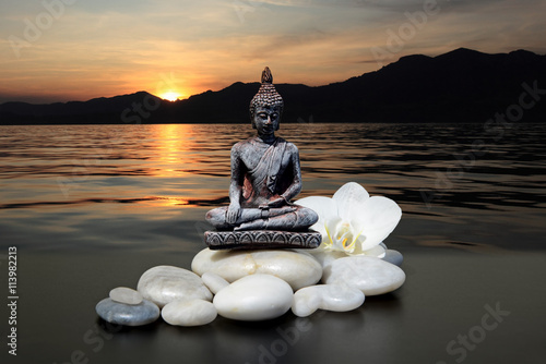 Photography Zen or Feng-Shui background-Buddha,zen stone,white orchid flowers
