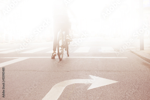 Photography Woman on bike into the bright