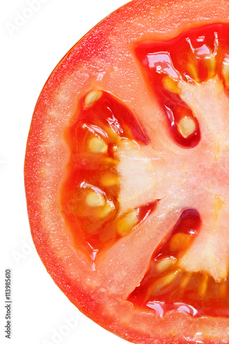 Juicy Red ripe tomato on a pure white background. Close up  image to emphasis the juice tomato.