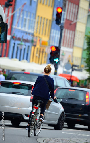 Female bicyclist on the street