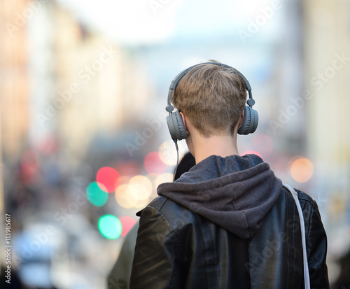 Head in silhouette with headphones