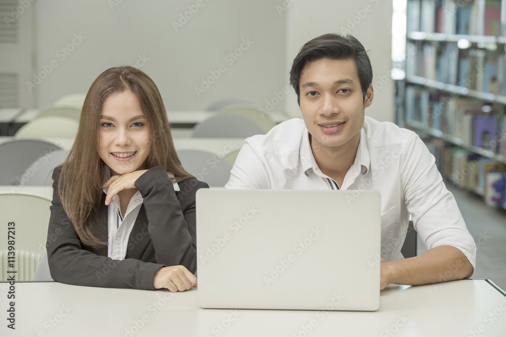Business people working at the office looking at the camera Business people working at the office looking at the camera