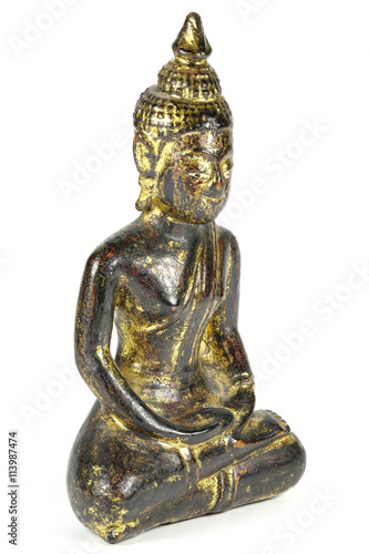 antique wooden Buddha in lotus position isolated on white background