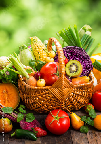 Fototapeta Naklejka Na Ścianę i Meble -  Fresh fruits and vegetables in the basket
