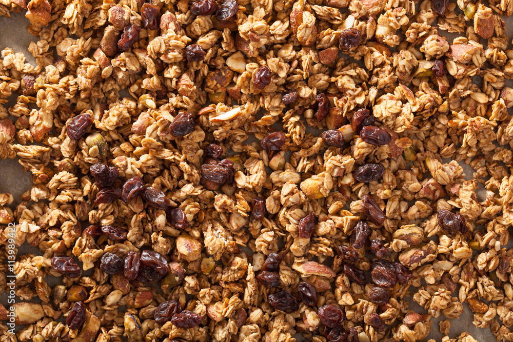 homemade healthy granola on backing paper background homemade healthy granola on backing paper background