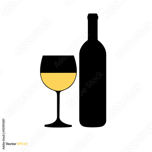 Glass and bottle of white chardonnay wine