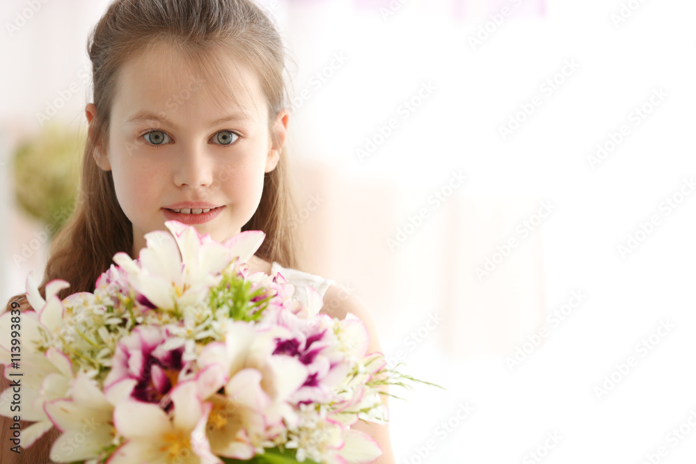 Beautiful small girl with fresh spring bouquet Beautiful small girl with fresh spring bouquet