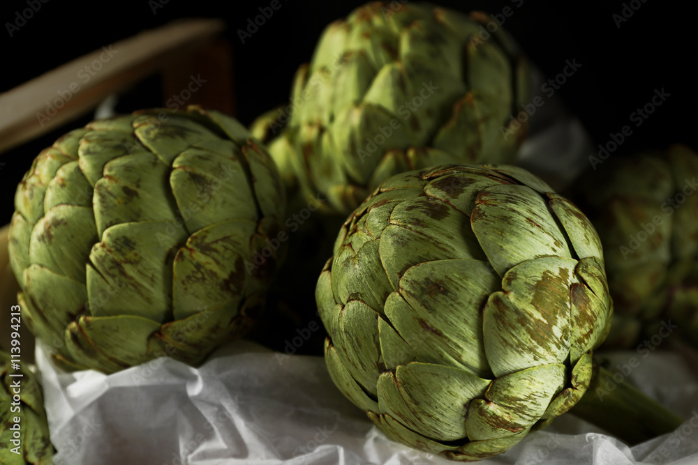 Fototapeta premium Artichokes in wooden box