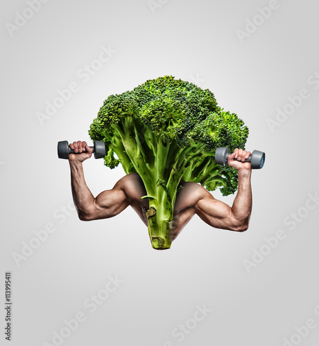 Broccoli with muscular man's hands.