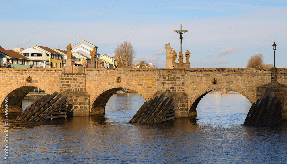 Stone Bridge in Sand (also unofficially Deer Bridge) is the oldest surviving bridge in the Czech Republic. In the Gothic style.On the bridge they are placed replicas of Baroque statues and crucifixes.