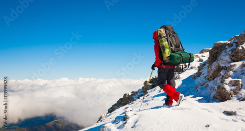 A man in mountain day winter