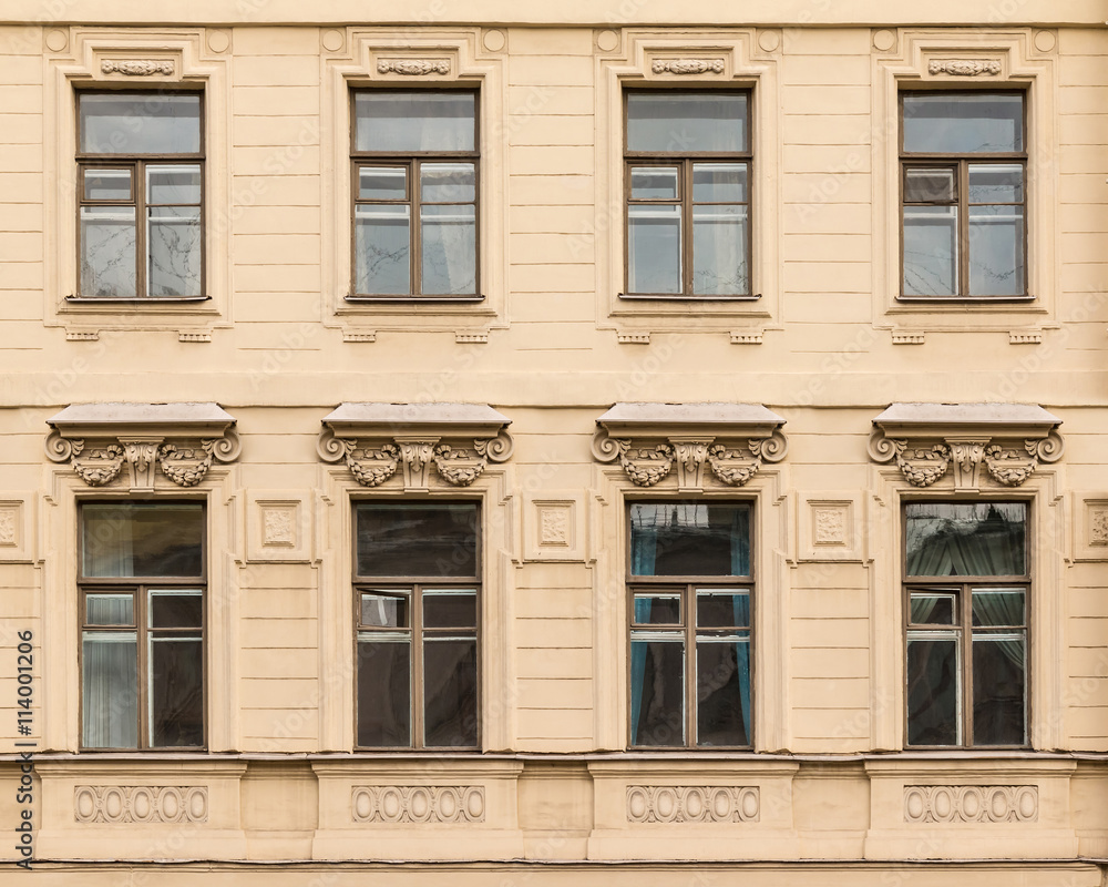 Several windows in a row on facade of the Saint-Petersburg University of Economics front view, St. Petersburg, Russia Several windows in a row on facade of the Saint-Petersburg University of Economics front view, St. Petersburg, Russia