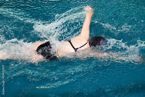 Girl swimming in the pool © schankz
