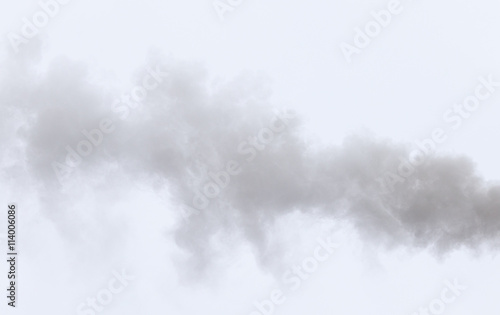 Smoke from a pipe on a cloudy sky