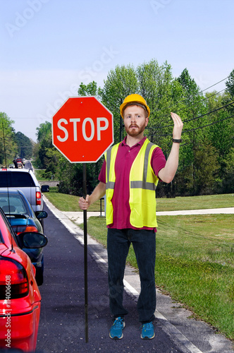Obraz na plátně Workman with Stop Sign