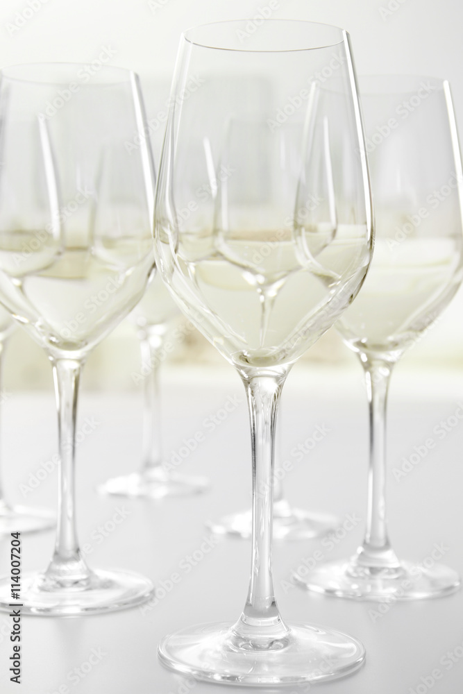 Wineglasses on blurred interior background Wineglasses on blurred interior background