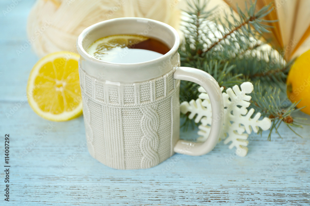 Beautiful winter composition with cup of hot drink, on wooden table Beautiful winter composition with cup of hot drink, on wooden table
