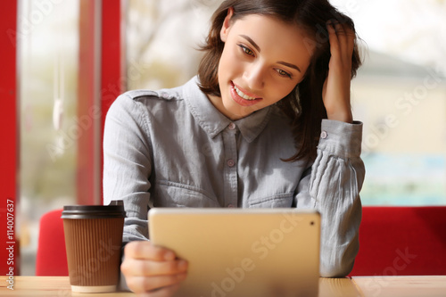 Young woman using digital t...
