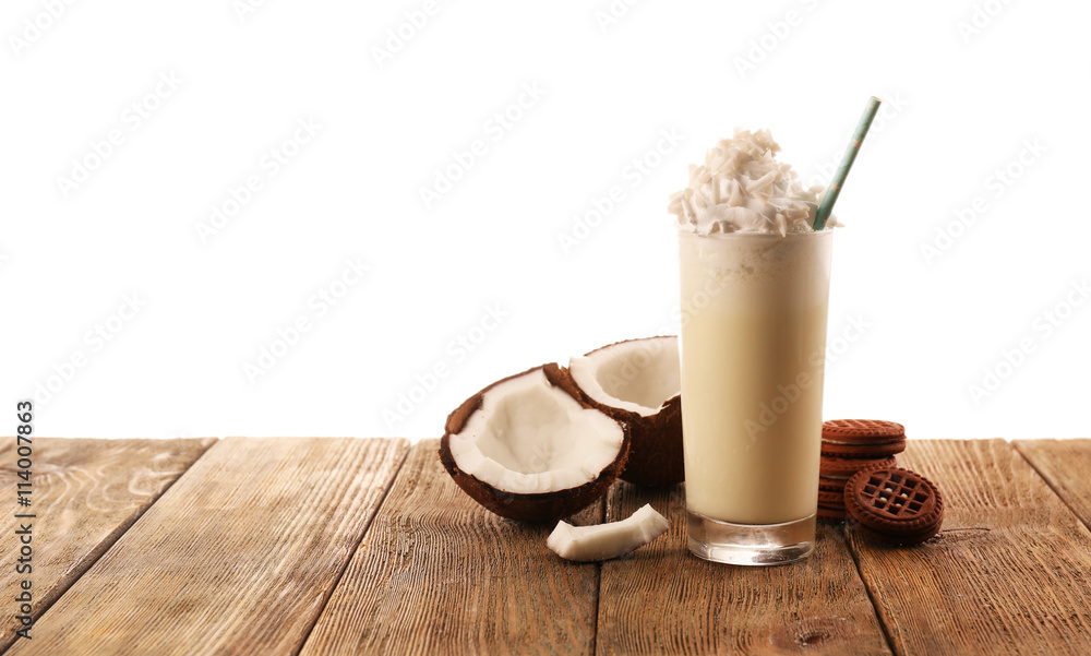 Delicious milkshake with coconut and cookies, isolated on white Delicious milkshake with coconut and cookies, isolated on white