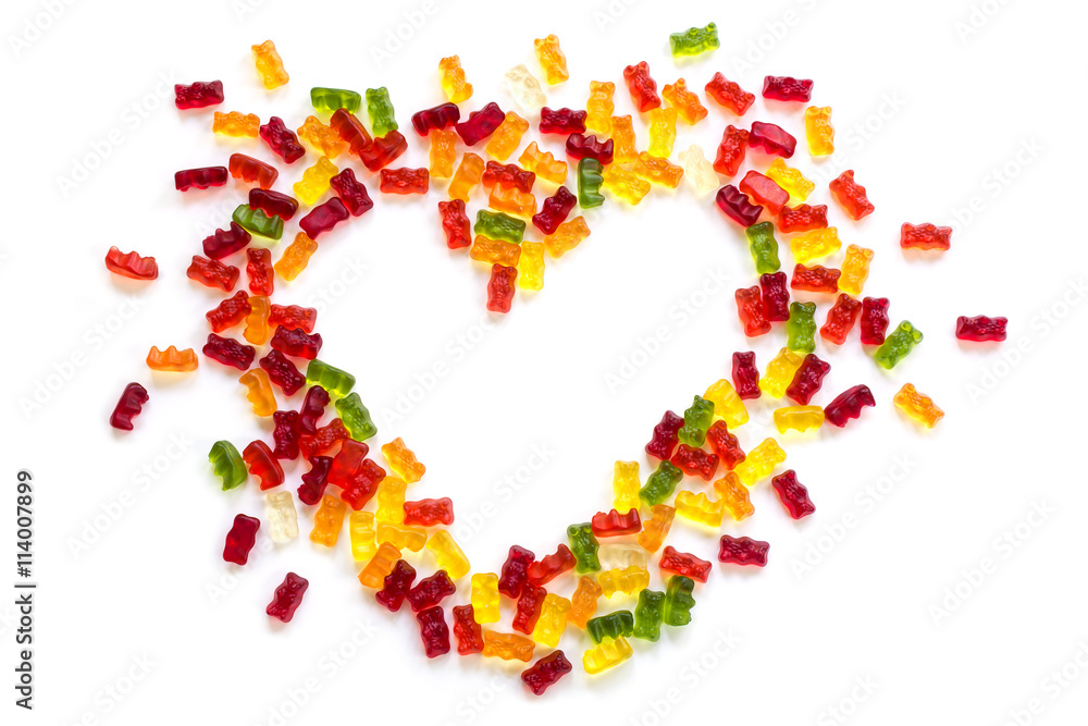 heart shape from gummy bears on a white background, love concept