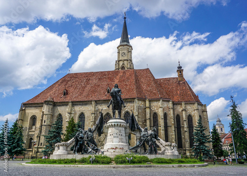 Cluj Napoca - Statue of Mathias Rex (Matyas Kiraly or Matei Corvin), and the medieval gothic Saint Michael Church photo