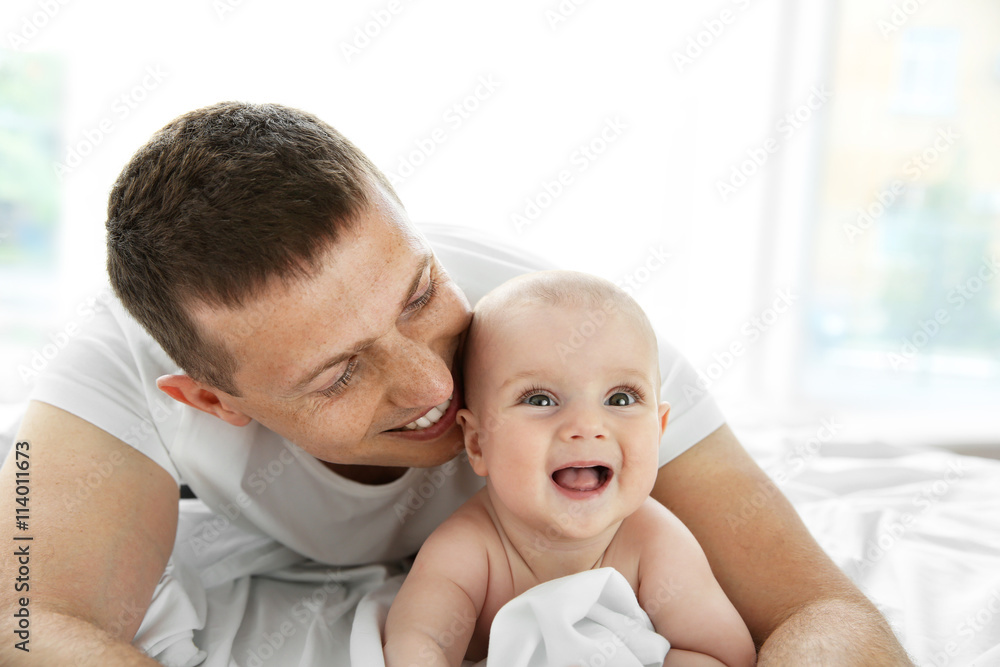Portrait of happy father and cute baby Portrait of happy father and cute baby