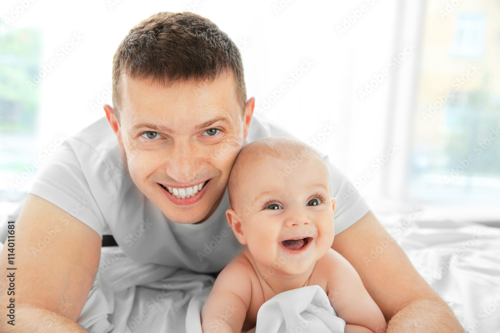 Portrait of happy father and cute baby Portrait of happy father and cute baby