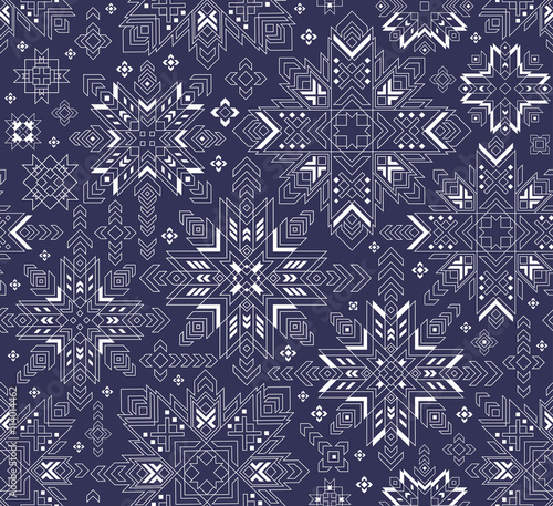 Seamless pattern with Latvian symbol auseklis made from polygon, vector image. photo