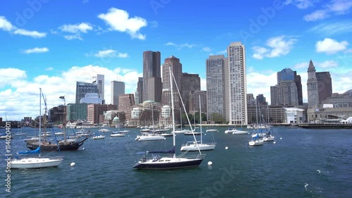 BOSTON, MA - Circa June, 2016 - A daytime establishing shot of the Boston skyline as seen from the harbor.	 	