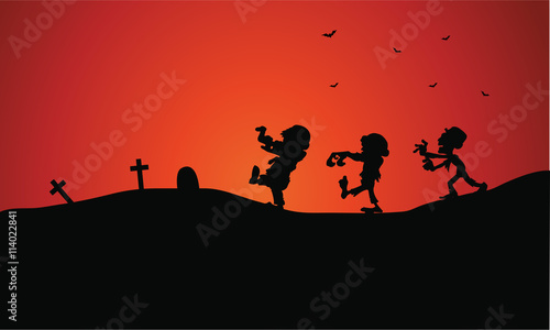 Silhouette of Halloween zombie in tomb