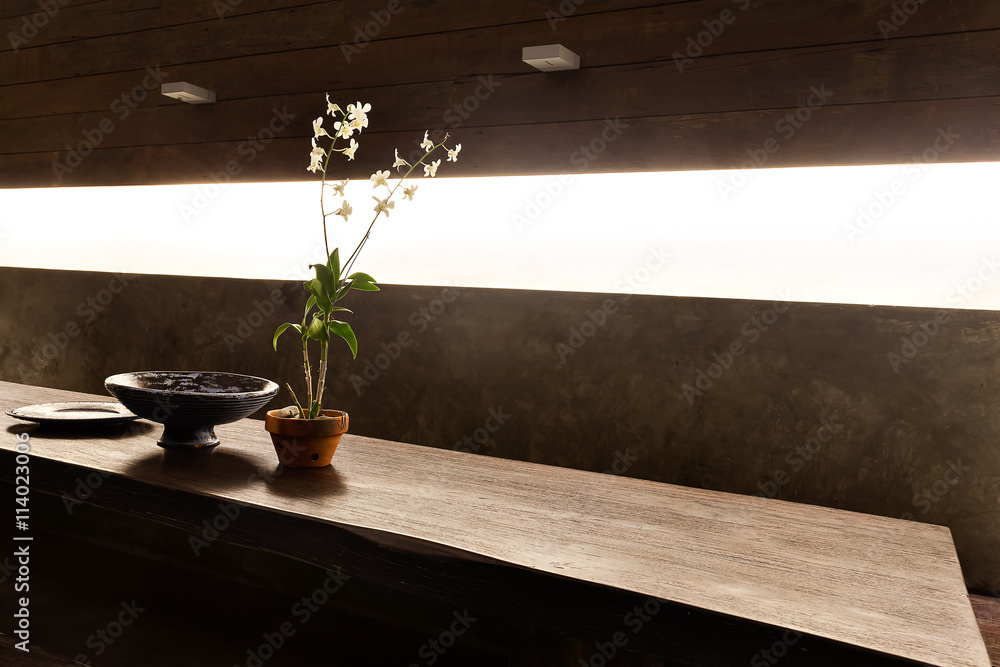 Flowering plant in a vase and other fancy items Flowering plant in a vase and other fancy items