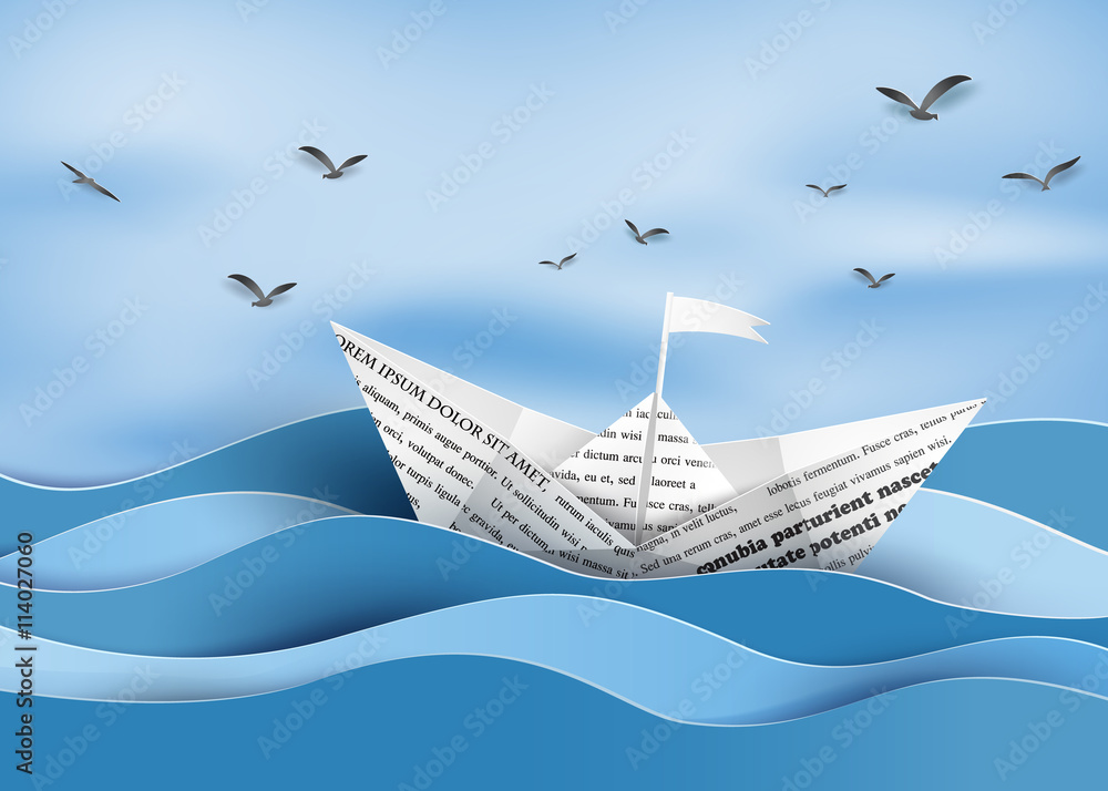 Obraz premium Paper Boat on Blue Ocean Waves