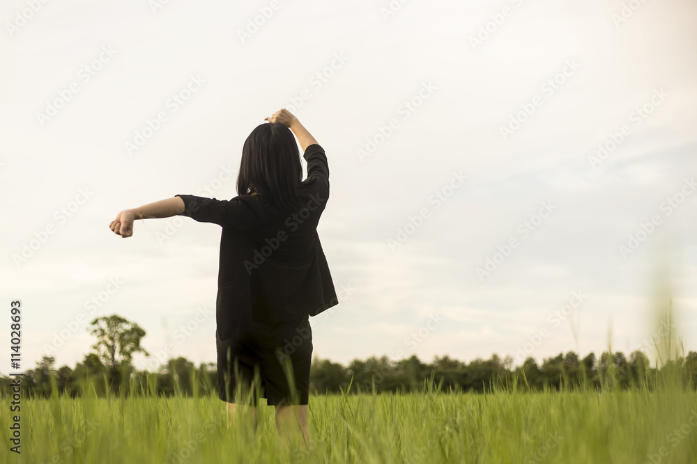 teenage girl enjoy with sunshine in wheat field teenage girl enjoy with sunshine in wheat field