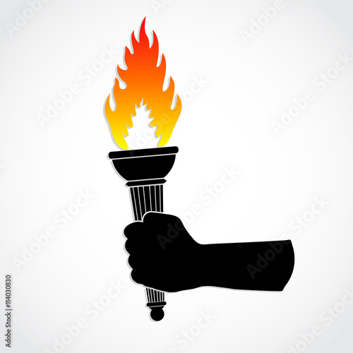 colof fite torch holding in silhouette hand photo