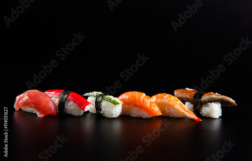 Japanese seafood sushi, on black background