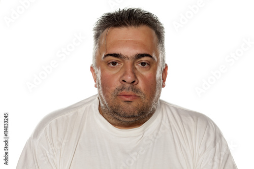 Portrait of a serious obese man