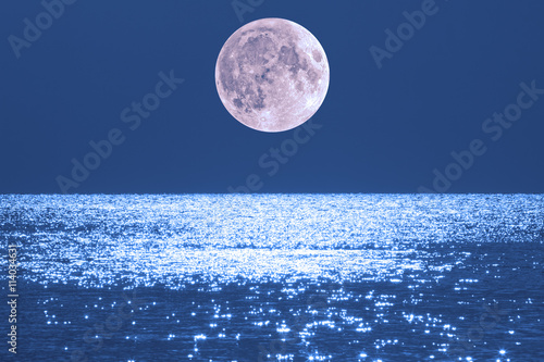 Moonrise over ocean/sea horizon. My work. No elements of NASA or other third party. Moon is my work.