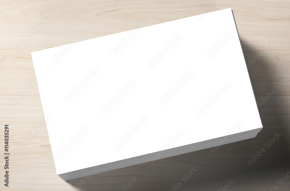 stack of white blank name card on wooden background stack of white blank name card on wooden background