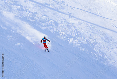 Skier on the slopes of the ski resort