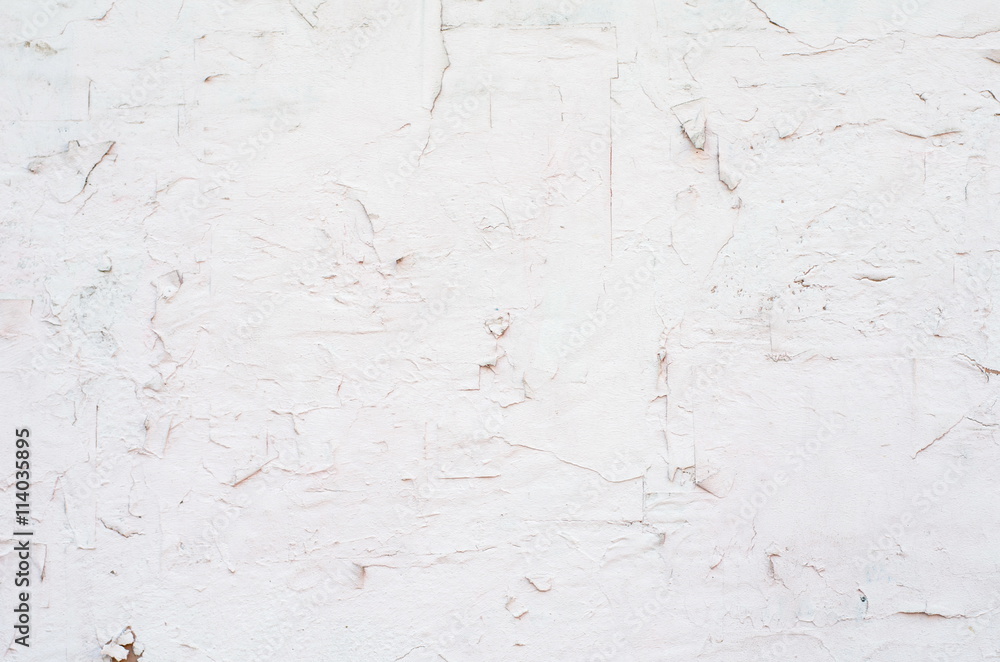 Aged white painted wall with subtle texture and cracks Aged white painted wall with subtle texture and cracks