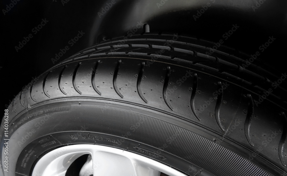 Dimples and sipes on the sidewall of summer tire detailed Stock Photo ...