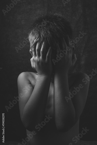 Wallpaper Mural scared and alone, young Asian child who is at high risk of being bullied, trafficked and abused, selective focus Torontodigital.ca