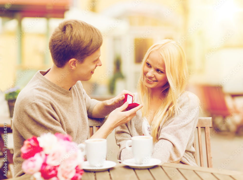 romantic man proposing to beautiful woman romantic man proposing to beautiful woman