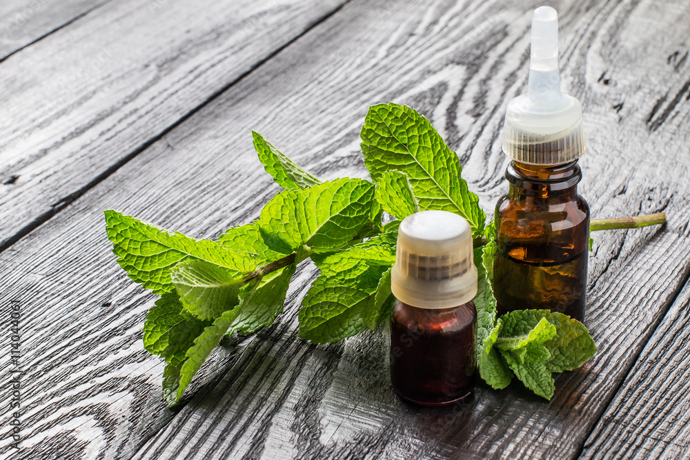 Essential oil and fresh mint Essential oil and fresh mint