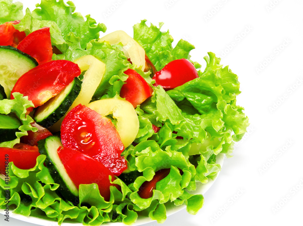 Fresh vegetable salad isolated on a white Fresh vegetable salad isolated on a white